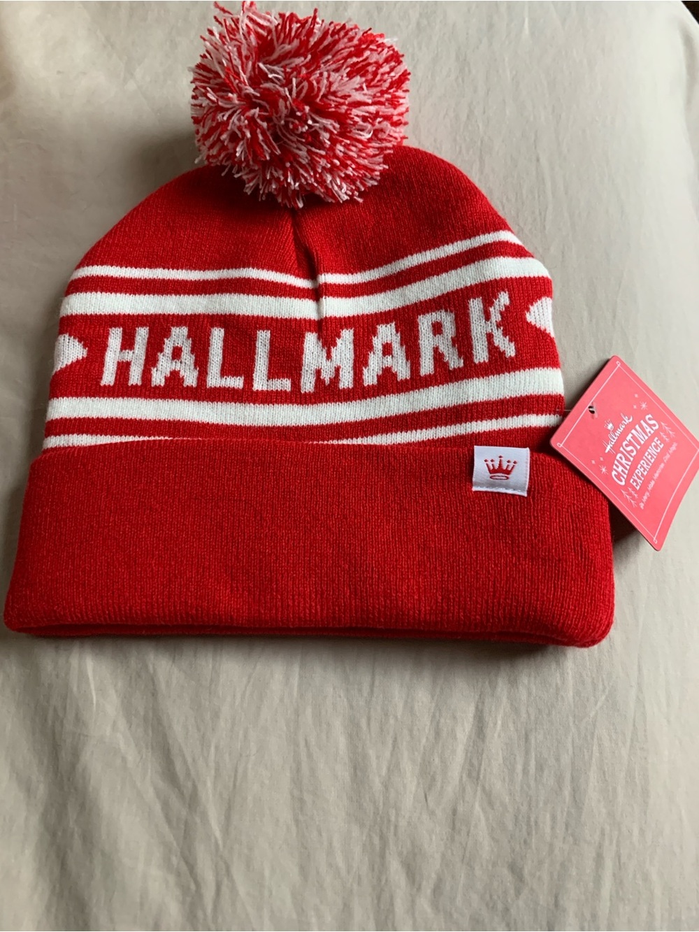 Hallmark Christmas Experience Knit Tousle Cap HoHoHo